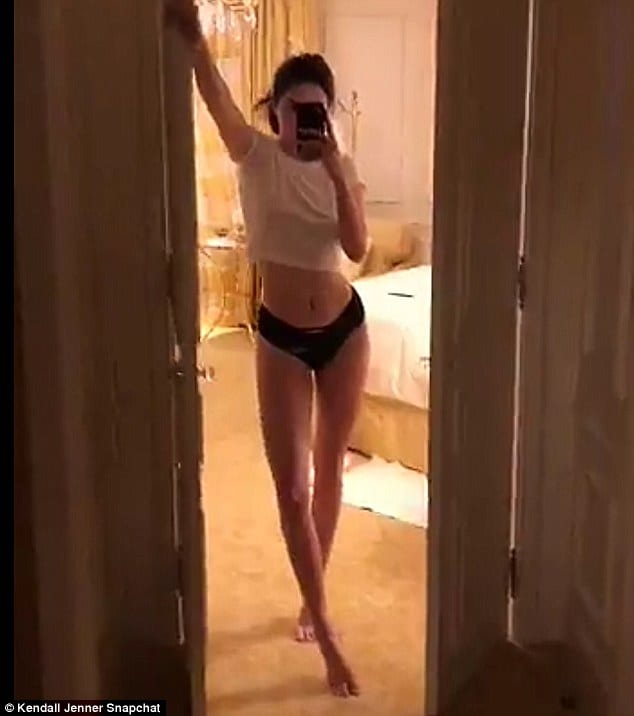 Gotta go to bed': Kendall Jenner flaunts her impossibly lean figure in undies and T-shirt... after confirming she is dating Blake Griffin