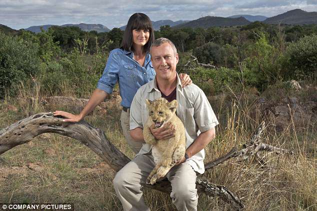 Award winning director, 47, died by Gerald the GIRAFFE as he films close up shot of the animal