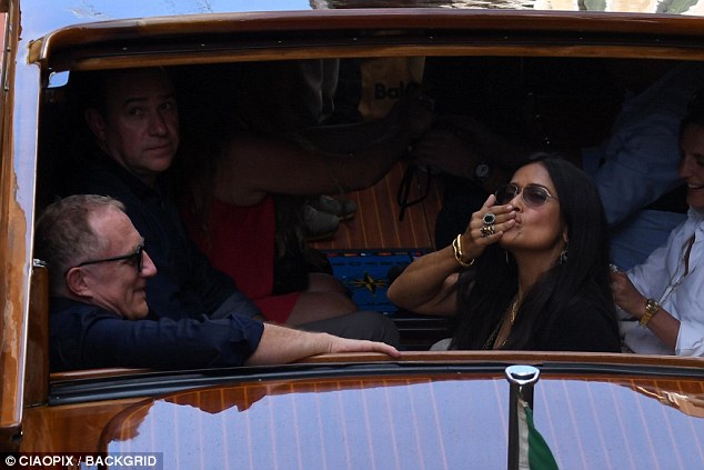 Salma Hayek and Francois-Henri Pinault take a boat trip after strolling in San Marco square in Venice