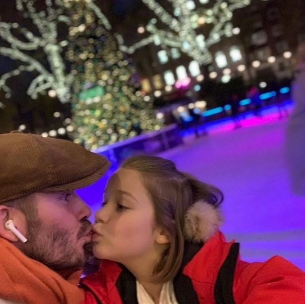 David Beckham shares kiss with daughter Harper as they enjoy ice skating trip