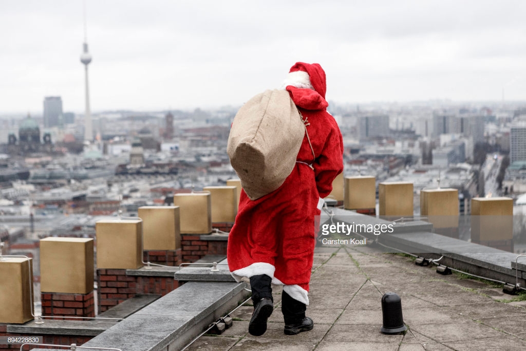 Santa swaps the chimney for an abseil in Berlin