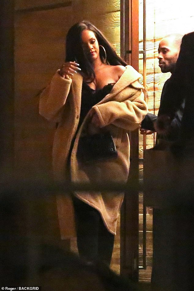 Rihanna sizzles in lacy black number while enjoying a late night dinner with billionaire boyfriend Hassan Jameel
