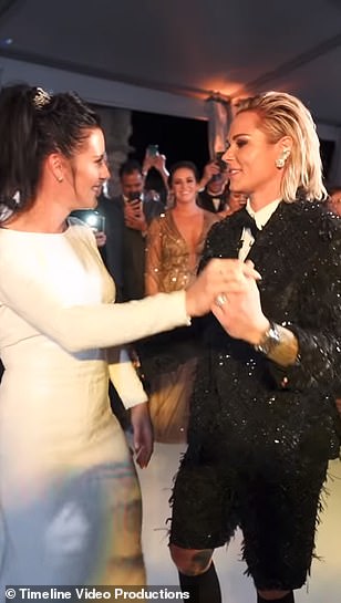 Having a ball! US soccer team stars Ashlyn Harris and Ali Krieger wow in tux and stunning white gown as they marry in 'Mediterranean castle' Miami ceremony
