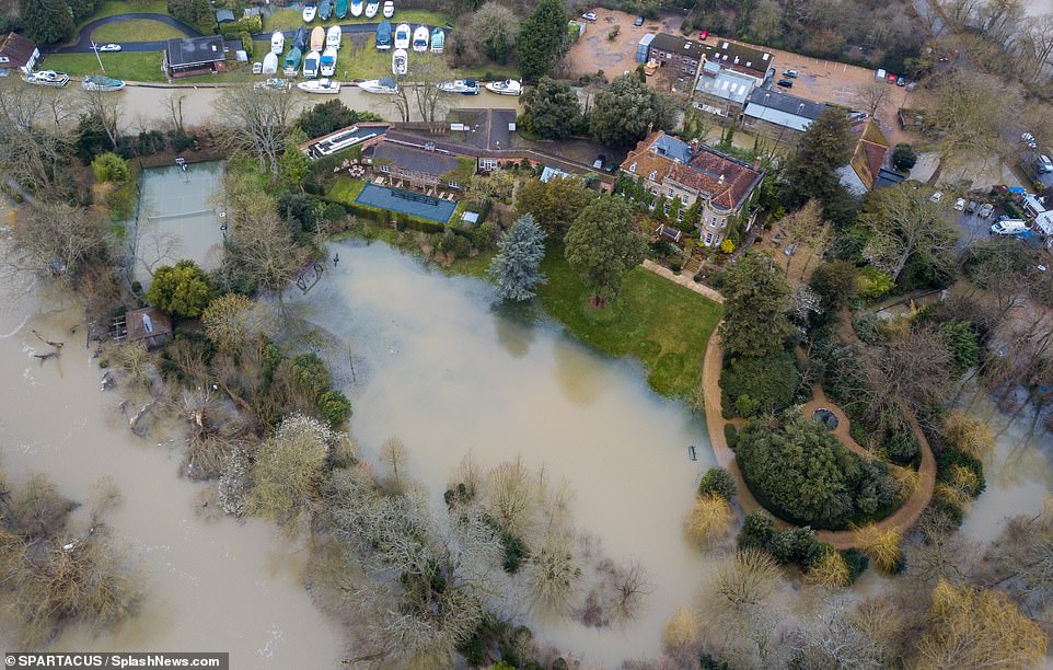 George and Amal Clooney's mansion is surrounded by flood water: £12m Grade-II listed home becomes submerged after Storm Dennis 